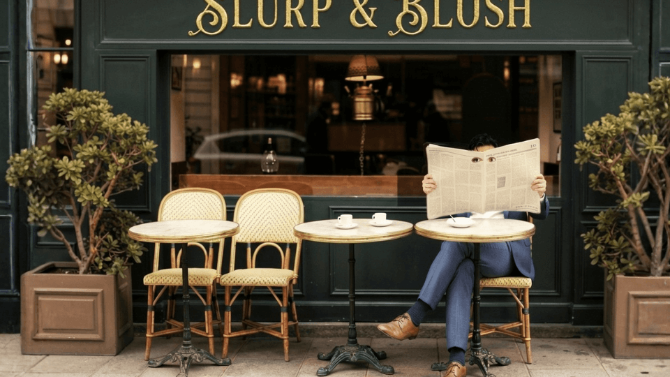 Martin discretely sitting at a cafe