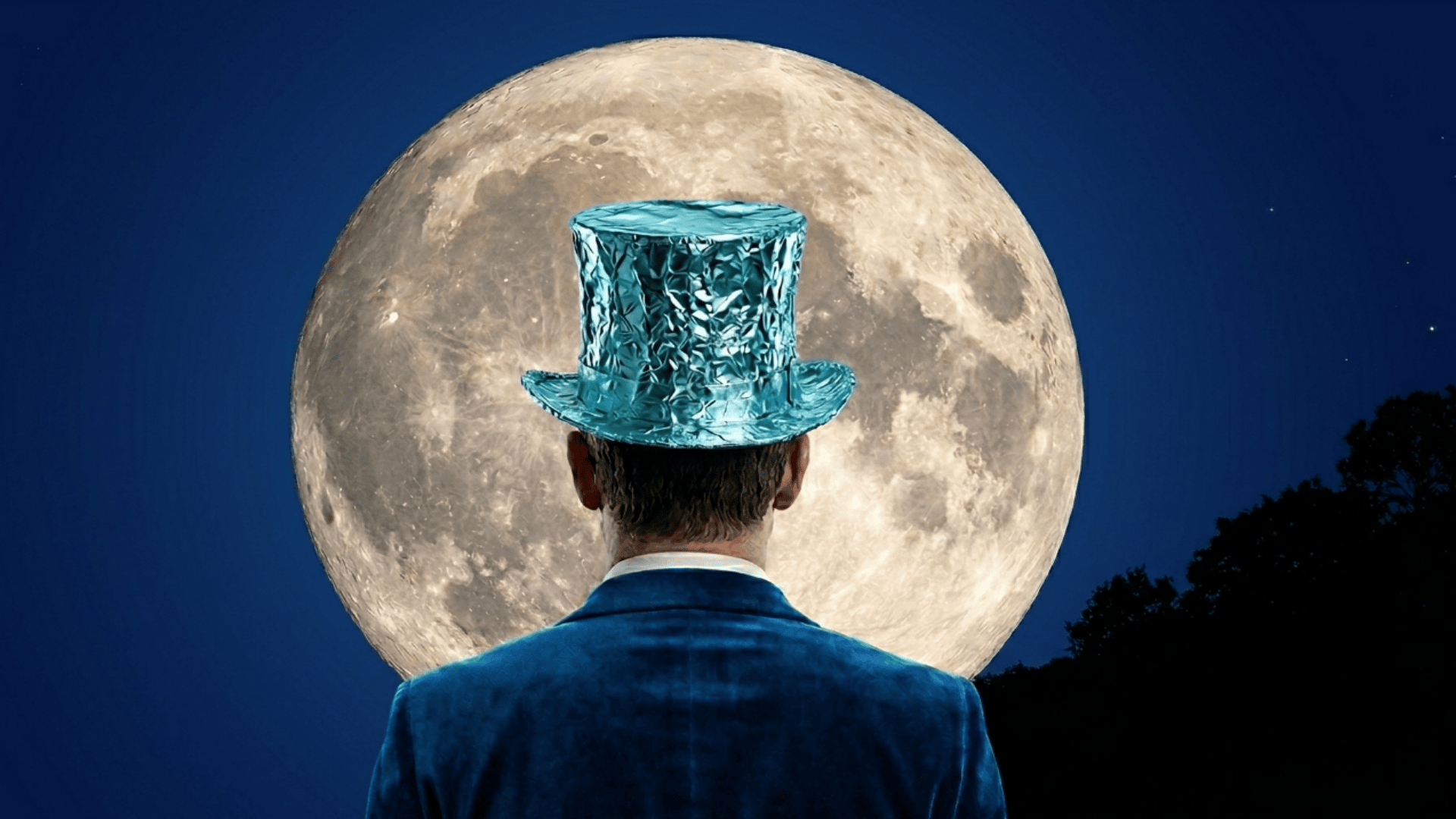 Man looking at the moon in a tin foil top hat